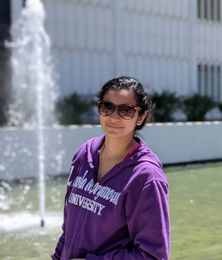 LMU API Ambassador Amrapali Gokani ’14 fountain