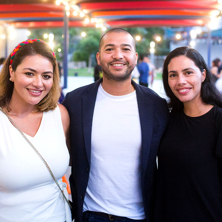 Three LAA alumni gather at a recent event.